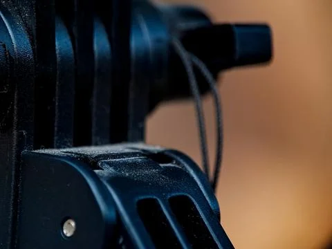 Close up of a black plastic camera mount component. Fotos de archivo