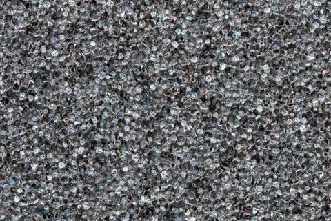 Close-up black  polyurethane foam texture. Rainbow film flares. Abstract blac 写真素材