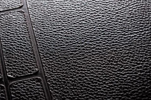 Close-up of the black rough leather surface Stock Photos