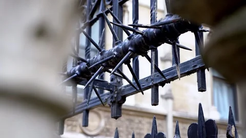 Close-Up of Black Rusting Iron Spiked Fence at Royal Courts of Justice, London Stock Footage 286717187