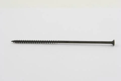 Close-up of black screw isolated on a white background Stock Photos