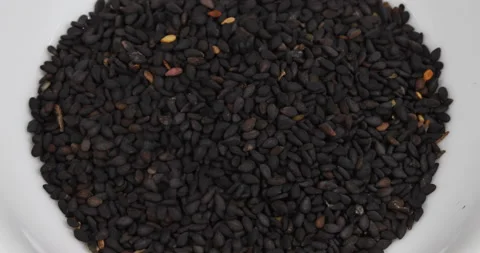 Close-up black sesame stop motion. Stock Footage 147028470
