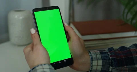 Close up of the black smartphone with chroma key screen in the female Caucasian Stock-Footage 104979077