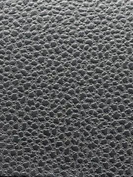 Close-up of black textured Фото