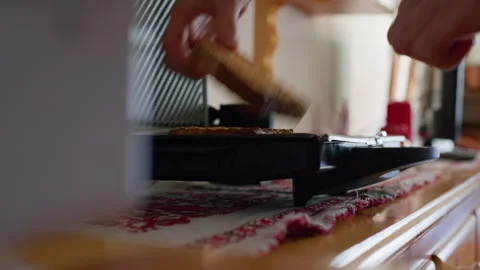 Close-Up Black Toaster Toasting Bread on Wooden Counter Stock Footage 316421685