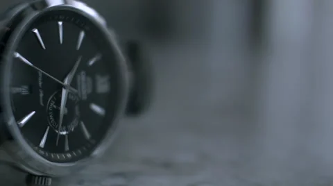 Close up of a black Wrist Watch with second hand against grey background Vídeo Stock 68191210