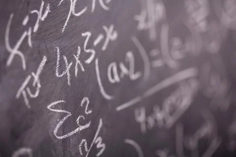 Close up of blackboard with maths equations Stock Photos