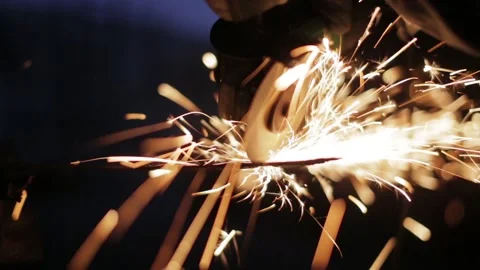 Close up of a Blacksmith cutting steel Stock Footage 233705287