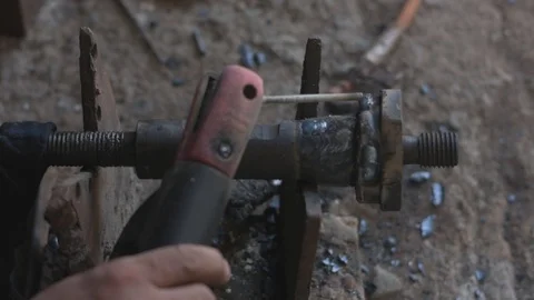 Close-up of blacksmith doing welding repair work using professional equipment Stock Footage 127343802