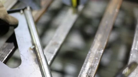 Close-up blacksmith welder in protective mask works with metal using a welding Stock Footage 139590408