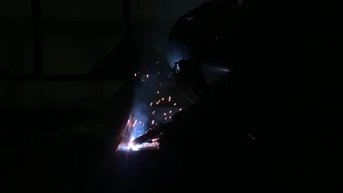 Close-up blacksmith welder works with  welding machine. Stock Footage 182729159