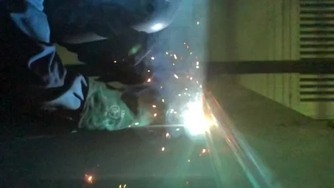 Close-up blacksmith welder works with  welding machine. Stock Footage 182729167