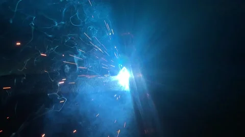 Close-up blacksmith welder works with  welding machine. Stock Footage 182729194