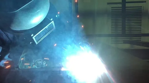 Close-up blacksmith welder works with  welding machine. Stock Footage 182729197