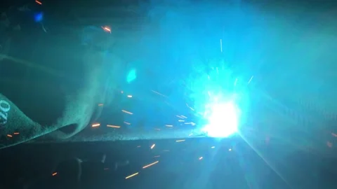 Close-up blacksmith welder works with  welding machine. Stock Footage 182729385
