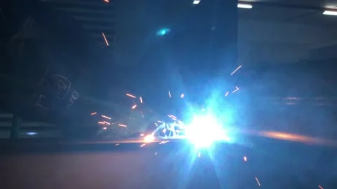 Close-up blacksmith welder works with  welding machine. Stock Footage 182729563