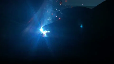 Close-up blacksmith welder works with  welding machine. Stock Footage 182729589