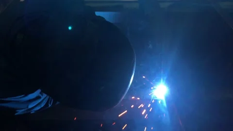 Close-up blacksmith welder works with  welding machine. Stock Footage 182729618