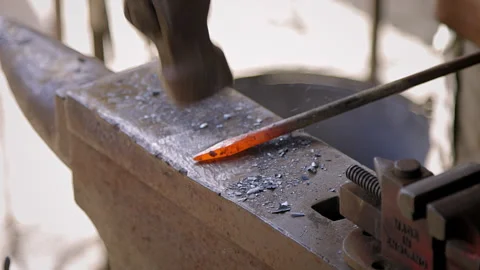 Close up of a Blacksmith at work Video stock 256212415