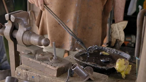 Close up of a Blacksmith at work Stock Footage 256212417