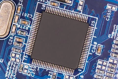 Close up blank microchip on Electronic circuit board. Stock Photos