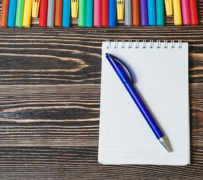 Close up Blank Note Book on Grunge Wood Stock Photos