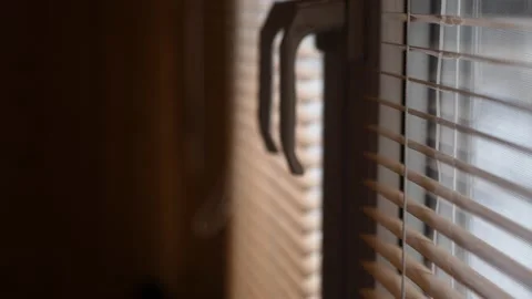 Close up the blinds close slowly. Stock Footage 149021585