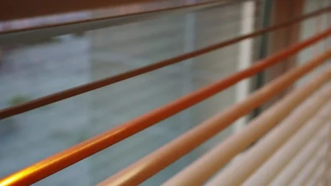 Close up of blinds Pan Shot , a smooth pan across elegant window blinds Stock Footage 242976885
