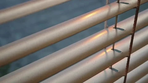 Close up of blinds Pan Shot , a smooth pan across elegant window blinds Stock Footage 242976976