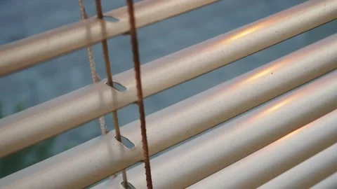 Close up of blinds Pan Shot , a smooth pan across elegant window blinds Stock Footage 242977008