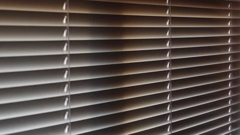 Close up of blinds Pan Shot , a smooth pan across elegant window blinds Stock Footage 242977094