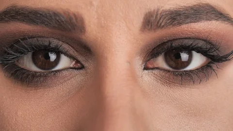 Close Up , blinking and looking up. Smokey eyes. Stock Footage 120480122