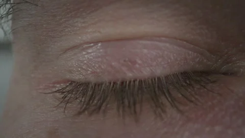 Close-up of a blinking eye 스톡 동영상 307711645