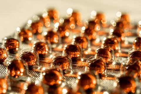 Close-up blisters with vitamin E capsule. Sun protection. Beauty and health Stock Photos