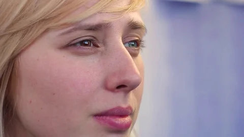 Close-up of a blonde with hyperchromic eyes 動画素材 73990299