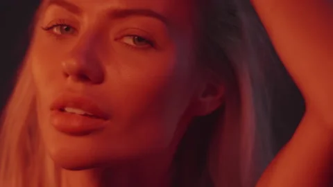 Close-up of a blonde with a night light Stock Footage 160129509