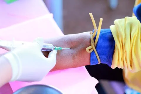 Close up of blood extraction in lab Stock Photos