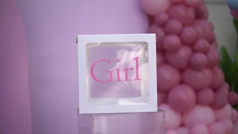 Close-up of Blue and Pink Balloon Garlands for Baby Gender Reveal Celebration Stock Footage 341008574