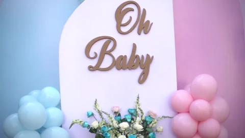 Close-up of Blue and Pink Balloon Garlands for Baby Gender Reveal Celebration Stock Footage 341008608