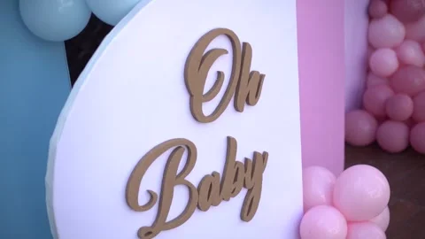 Close-up of Blue and Pink Balloon Garlands for Baby Gender Reveal Celebration Stock Footage 341008632