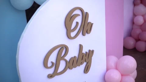 Close-up of Blue and Pink Balloon Garlands for Baby Gender Reveal Celebration Stock Footage 341008784