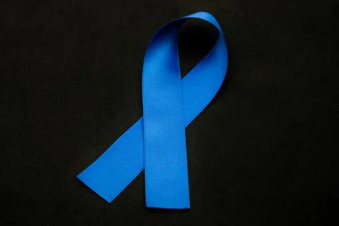 Close-up of a blue bow on black background 스톡 사진