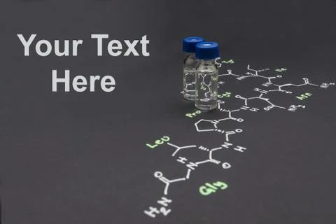 Close-up blue cap sample vial on paper with chemical formula of Oxytocin (l.. Stock Photos