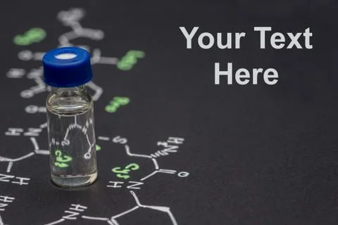 Close-up blue cap sample vial on paper with chemical formula of Oxytocin (l.. Stock Photos
