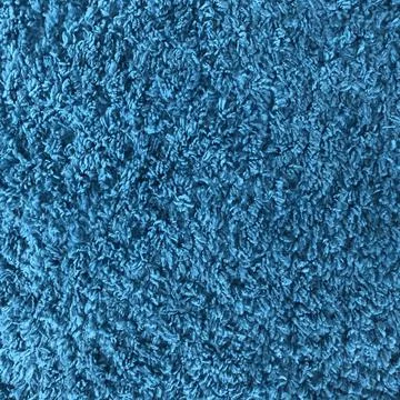 Close up blue carpet texture. Cool background Stock Photos