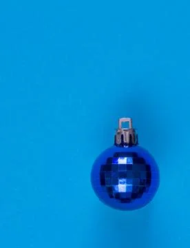 Close-up blue christmas bubble isolate on blue background, selective focus Stock Photos