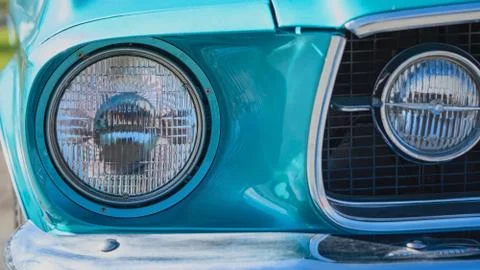Close Up Of Blue Classic Car Headlight Stock Photos
