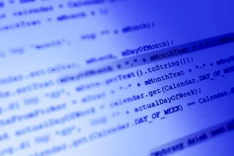 Close-up of blue computer code on a screen, representing technology and 스톡 사진