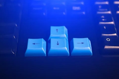 Close-up of blue computer keys on gaming keyboard. Stock Photos