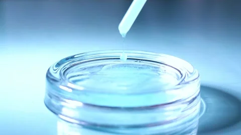 Close up of Blue Copper Peptides GHK-Cu in Pipette. Beauty serum for anti aging Stock Footage 328370584